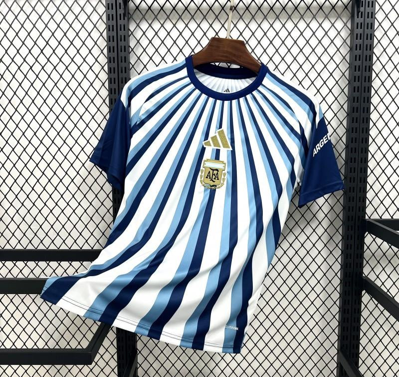 Blue and white striped shirt with a logo on a hanger against a wire mesh background
